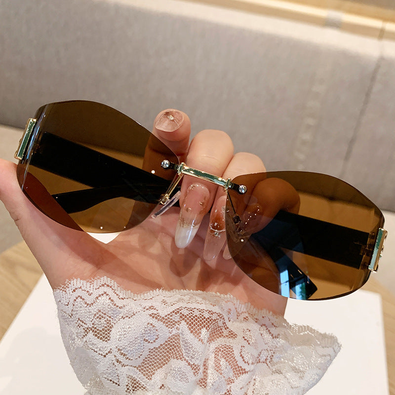 Wholesale Retro rimless oval curved lens sunglasses